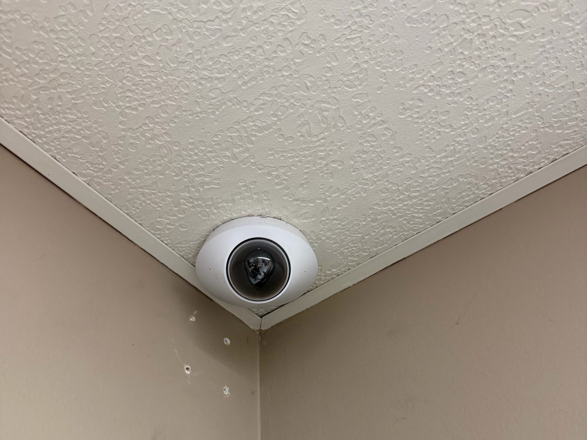 Dome camera in an office ceiling corner