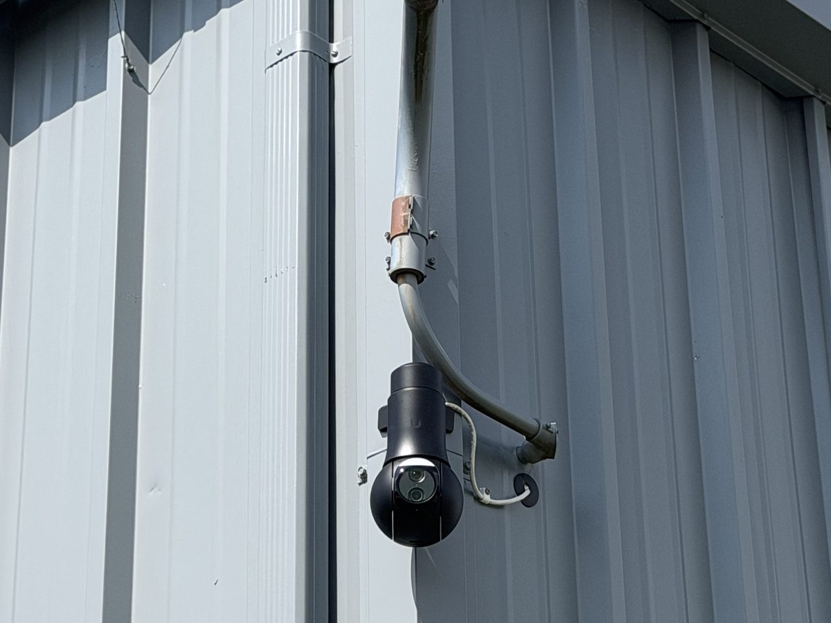 Outdoor PTZ camera on a metal shop building