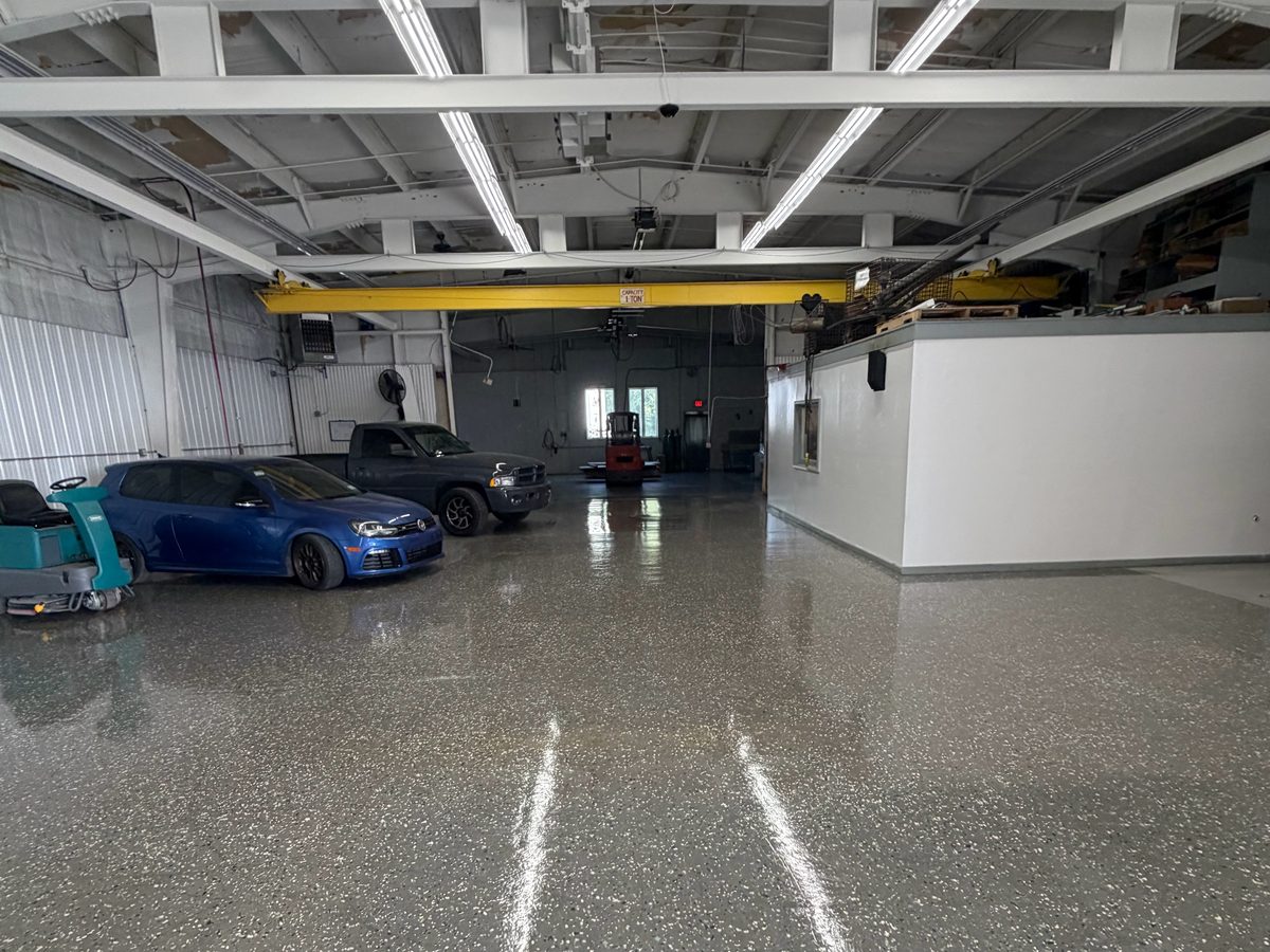 Auto body shop floor covered by new cameras and Wi-Fi